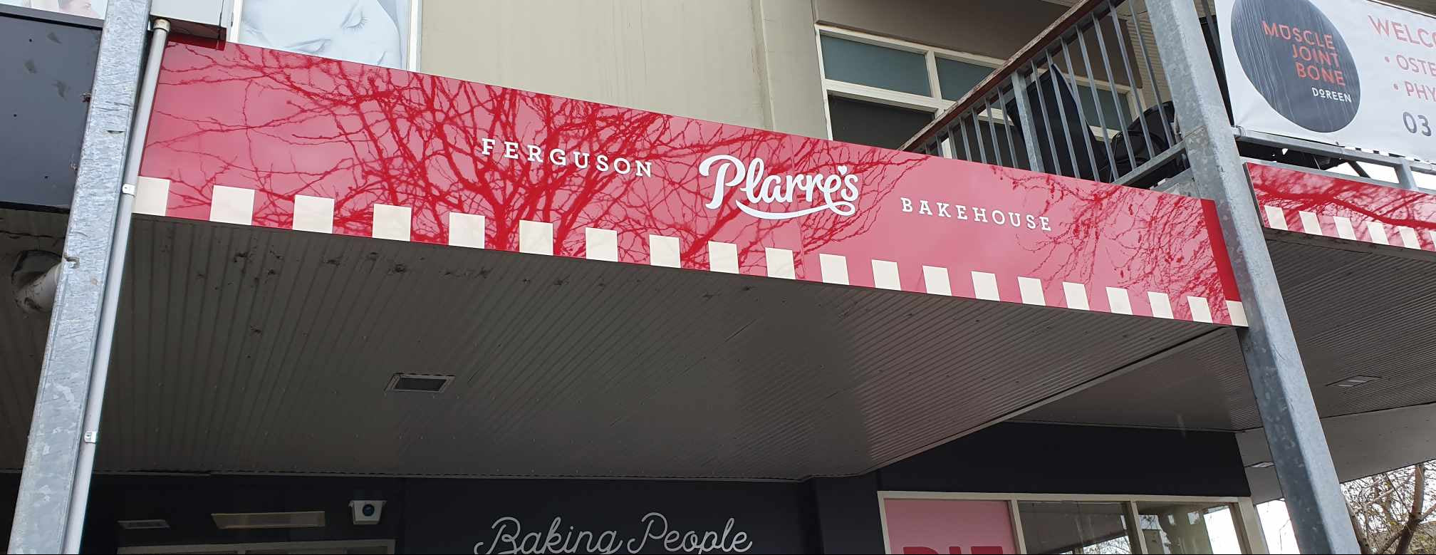 Doreen cafe store with new signage that is clean and fresh by Anytime Signs